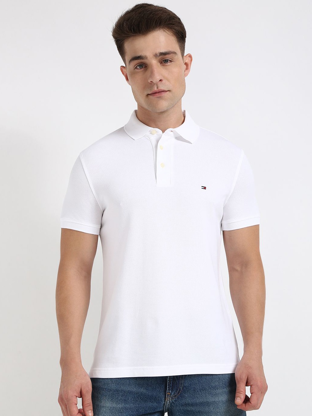 

Tommy Hilfiger Men Solid Polo Collar Cotton Slim Fit T-shirt, White