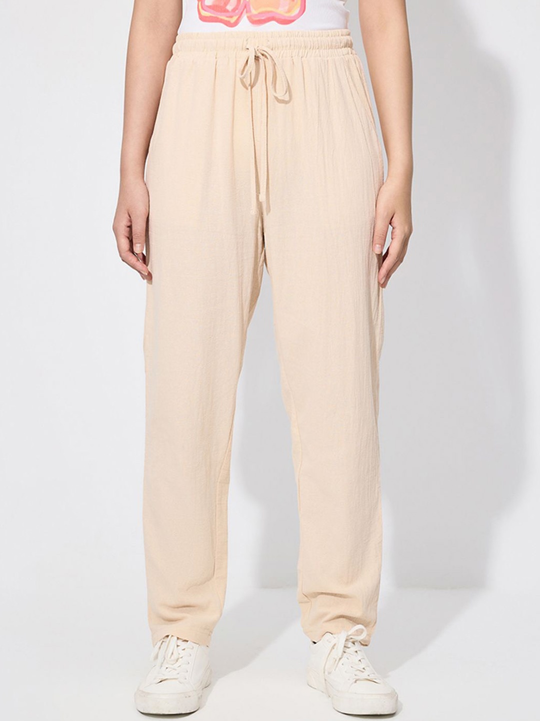 

StyleCast Women Cotton Relaxed Mid-Rise Regular Fit Trousers, Beige