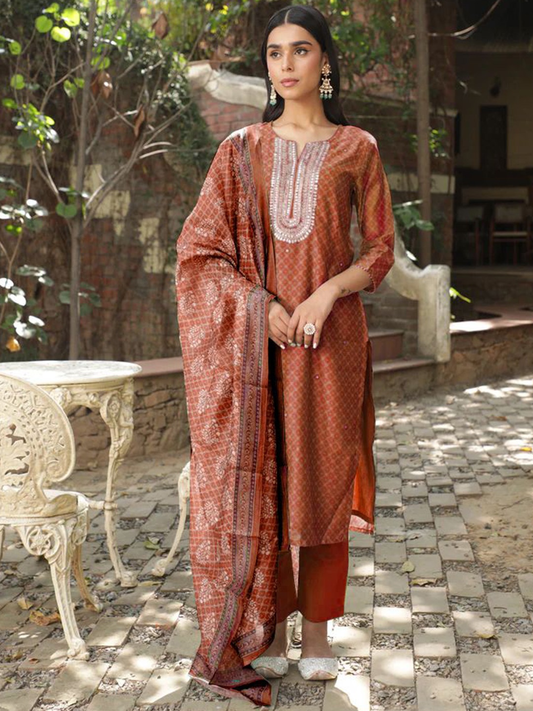 

Anouk Women Embroidered Regular Mirror Work Chanderi Silk Kurta with Trousers & With Dupatta, Rust