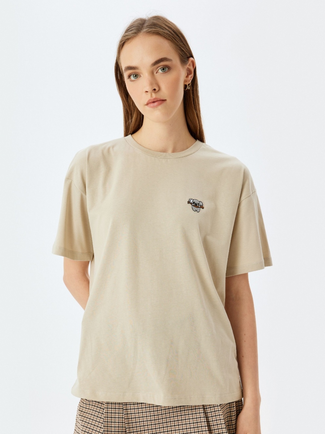 

Koton Women Solid Round Neck Cotton Oversized T-shirt, Beige