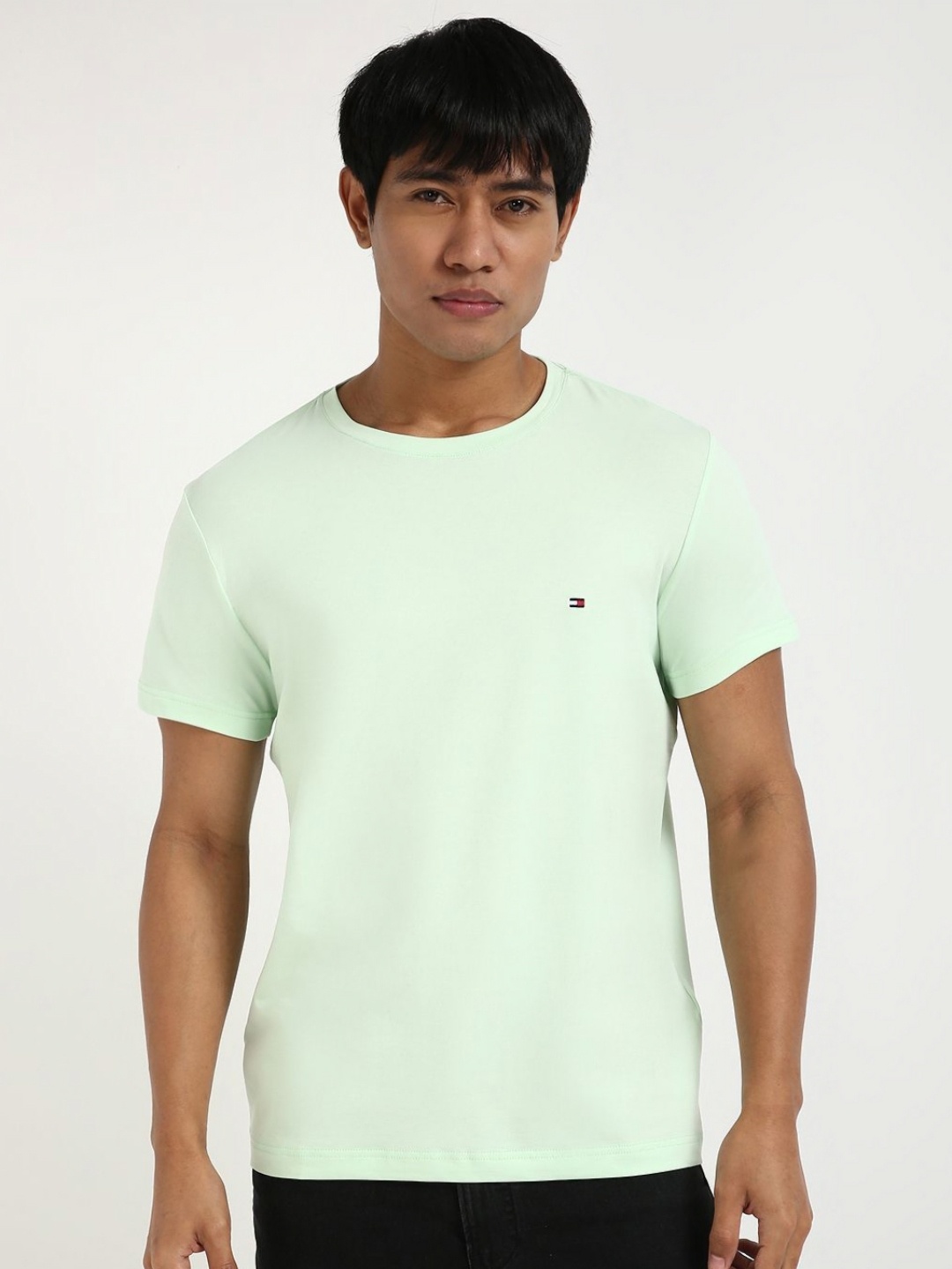

Tommy Hilfiger Men Solid Round Neck Cotton Slim Fit T-shirt, Green