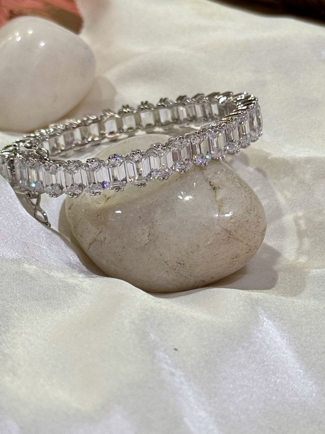 

The Jewellery Tale Women Brass Crystals Silver-Plated Bangle-Style Bracelet