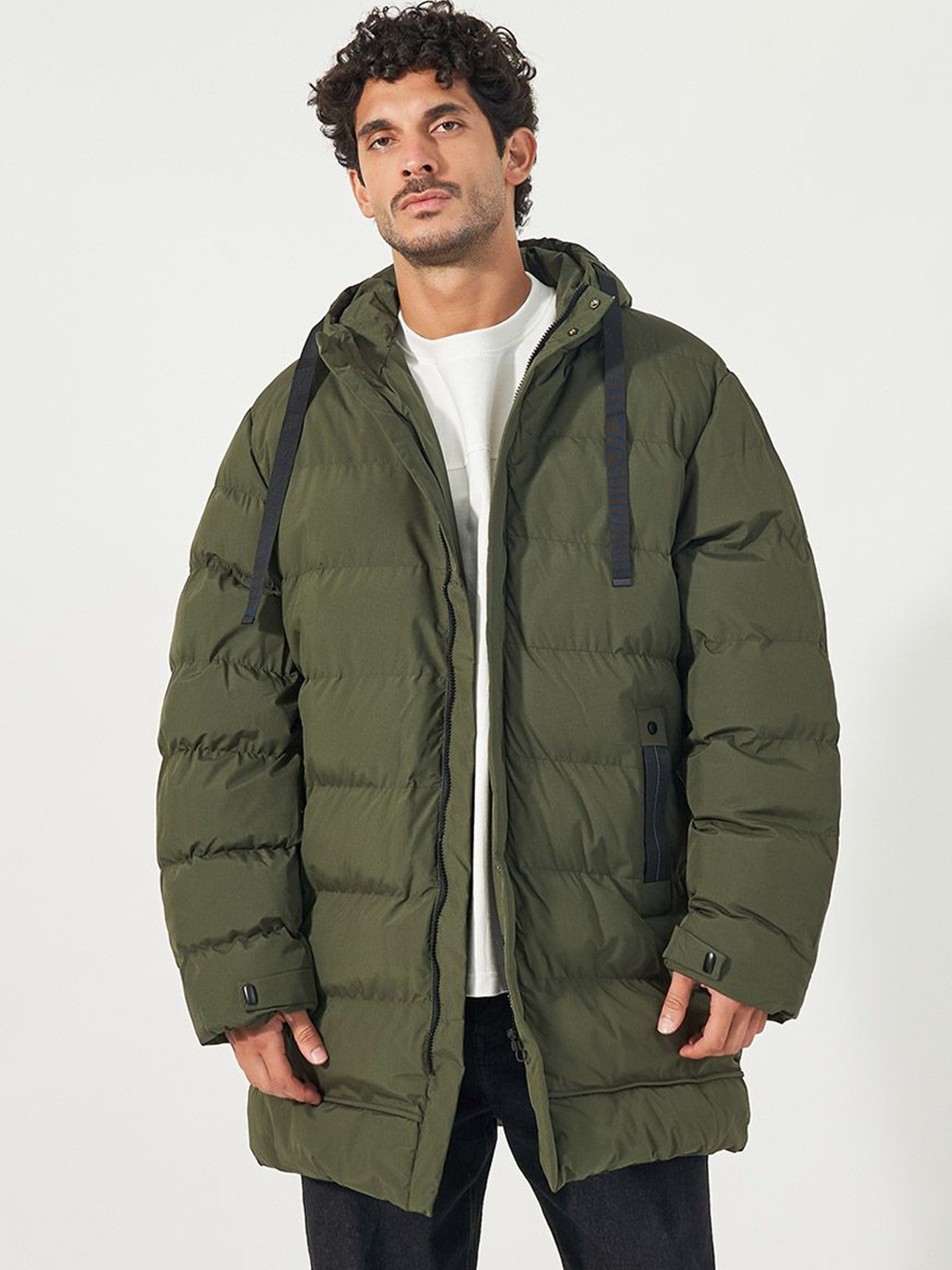 

Styli Men Longline Hooded Puffer Parka Jacket with Drawstring Tape Detail, Olive