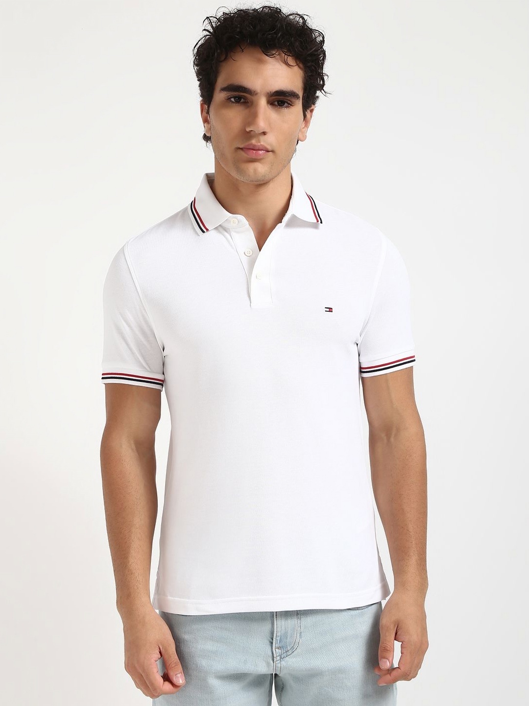 

Tommy Hilfiger Men Solid Polo Collar Cotton Slim Fit T-shirt, White