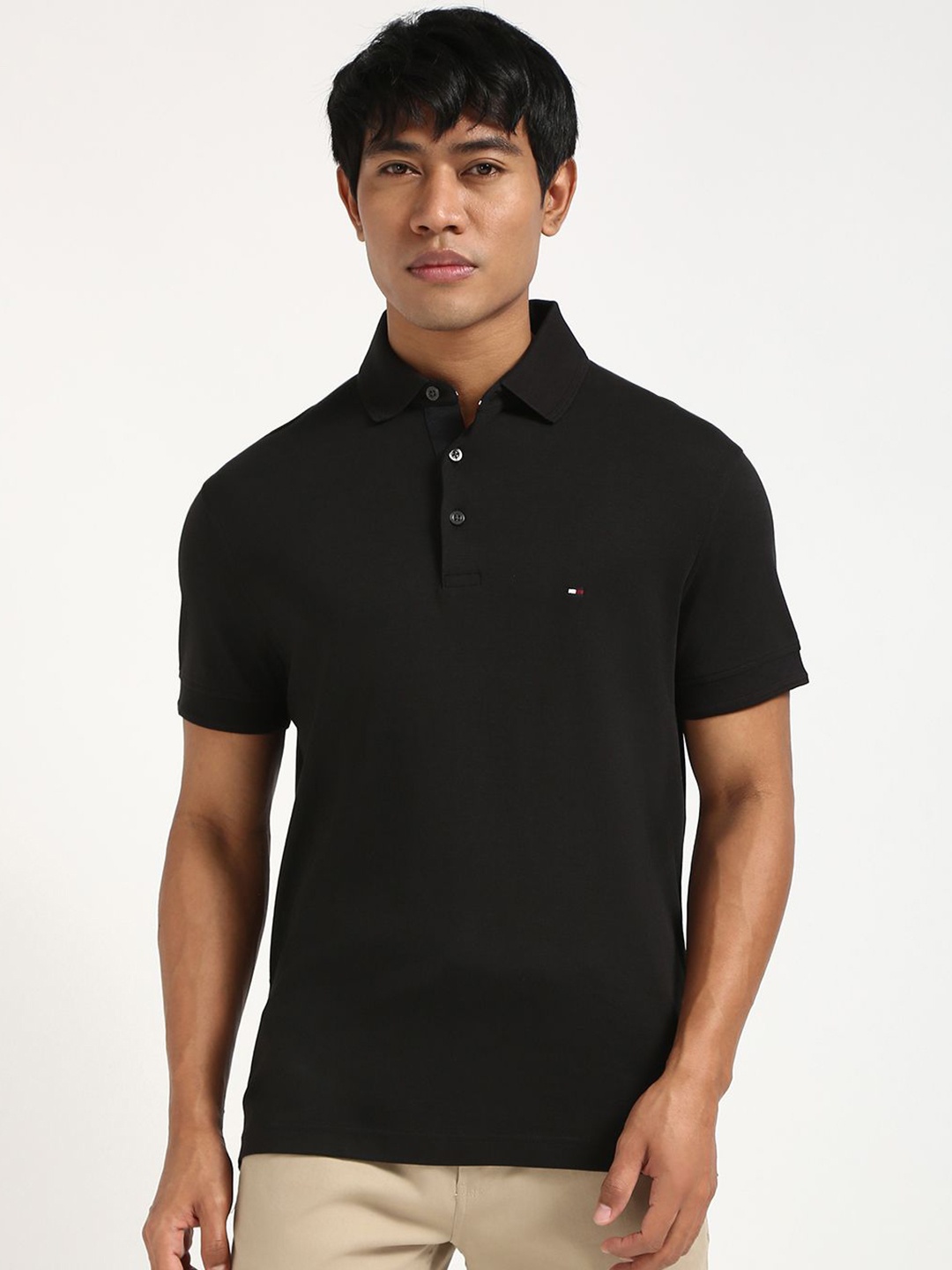 

Tommy Hilfiger Men Solid Polo Collar Cotton Slim Fit T-shirt, Black