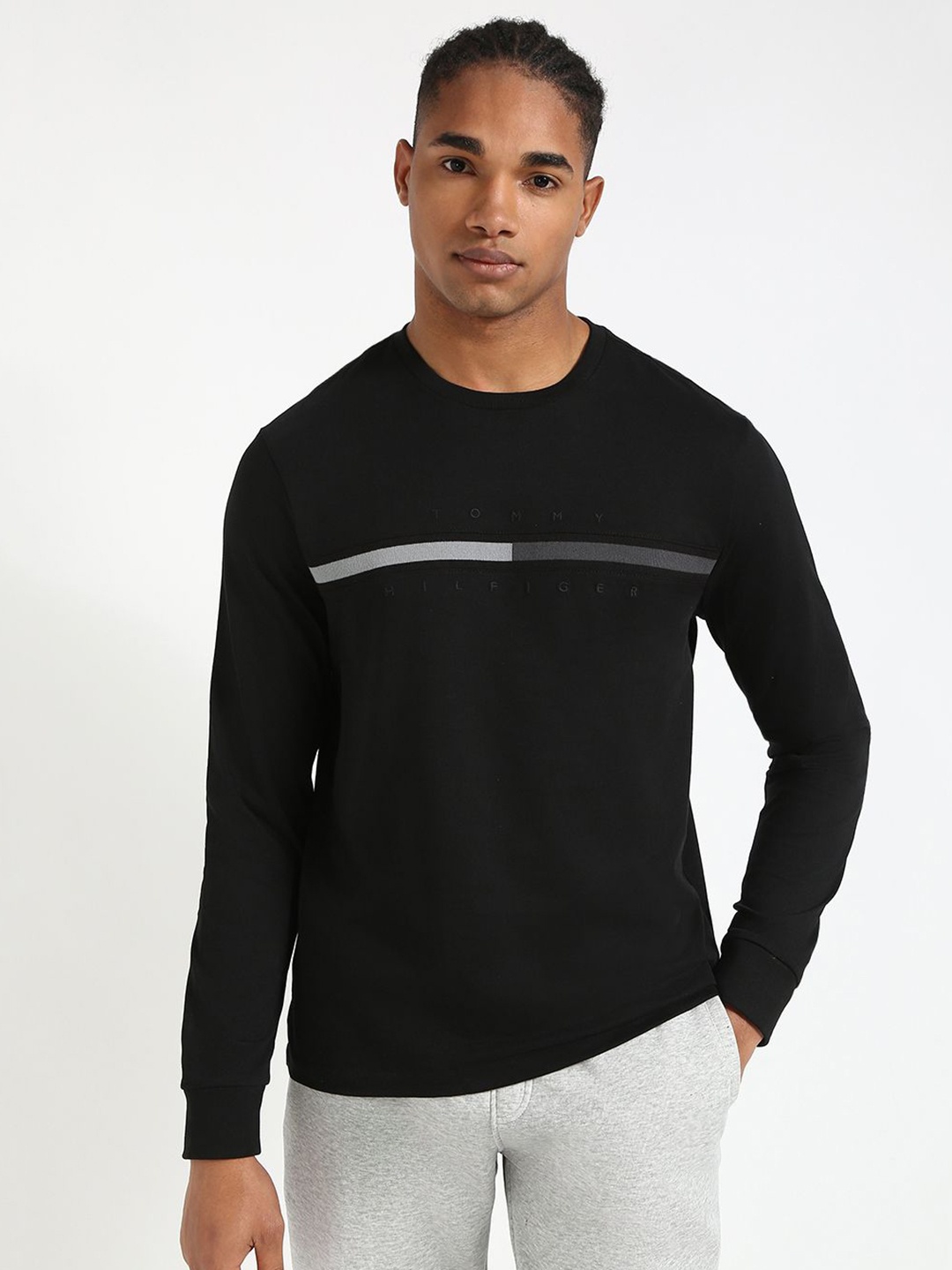 

Tommy Hilfiger Men Solid Round Neck Cotton T-shirt, Black