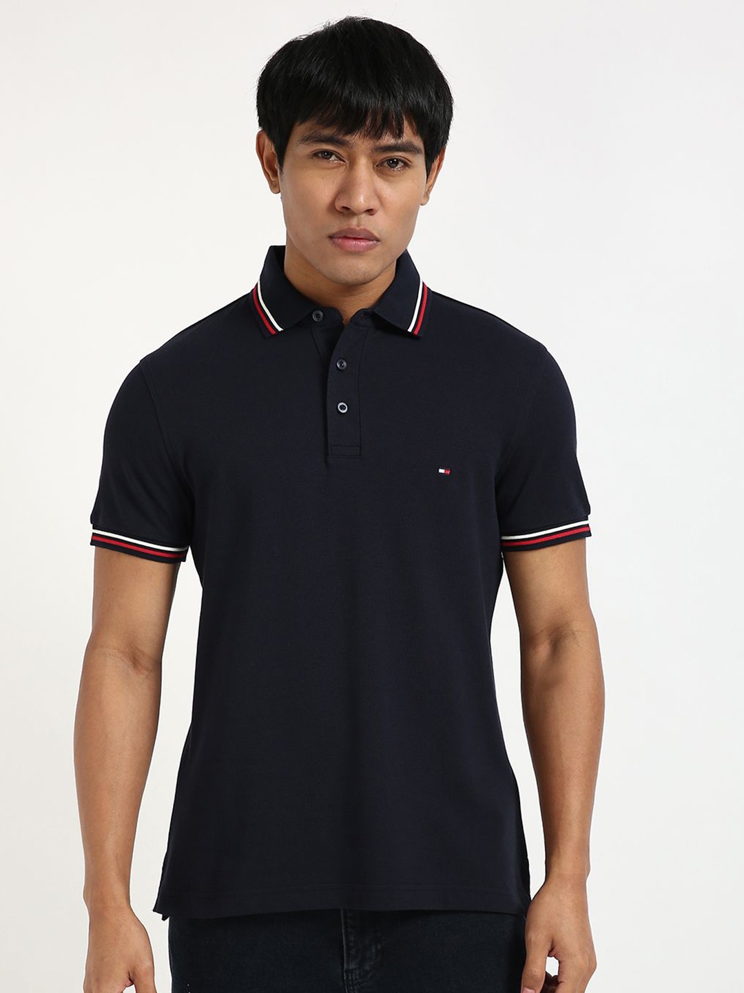 

Tommy Hilfiger Men Solid Polo Collar Cotton Slim Fit T-shirt, Navy blue