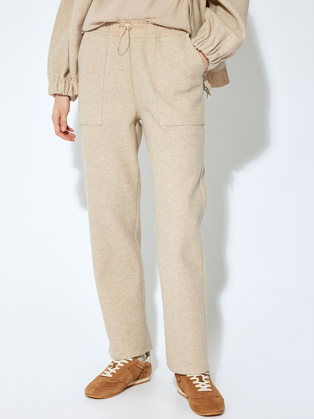 

Koton Women Regular Fit Mid-Rise Trousers, Beige