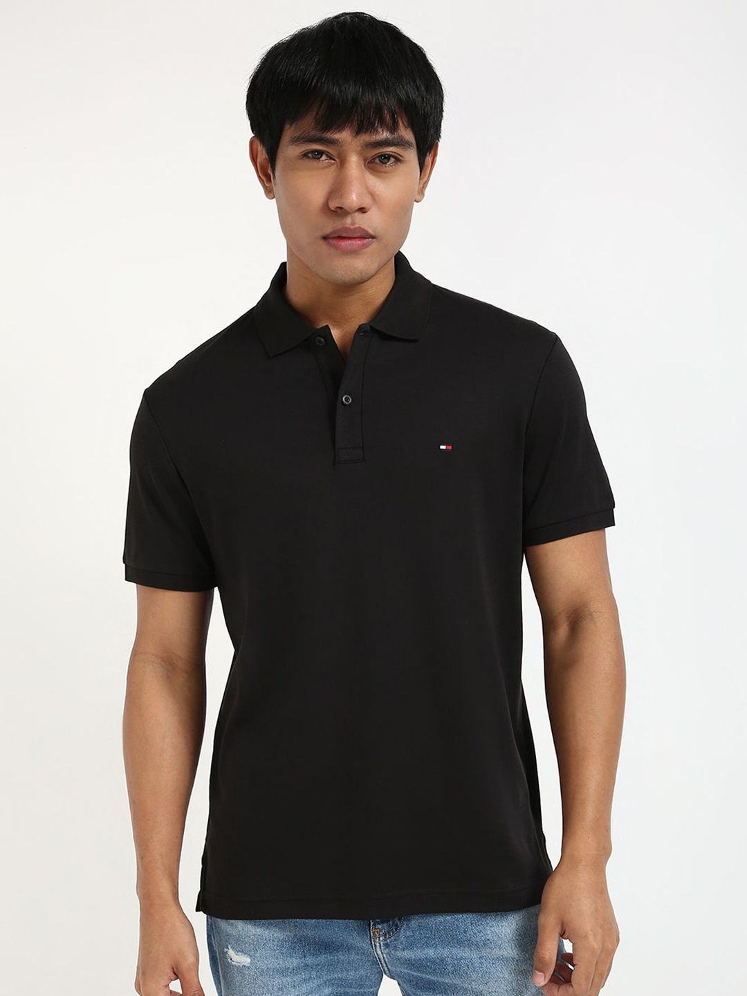 

Tommy Hilfiger Men Solid Polo Collar Cotton T-shirt, Black