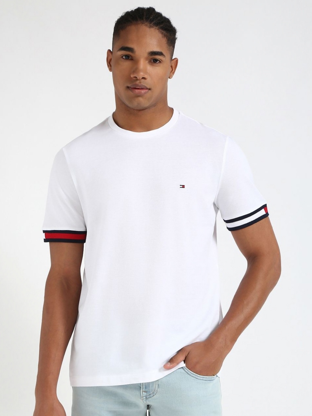 

Tommy Hilfiger Men Solid Round Neck Cotton T-shirt, White