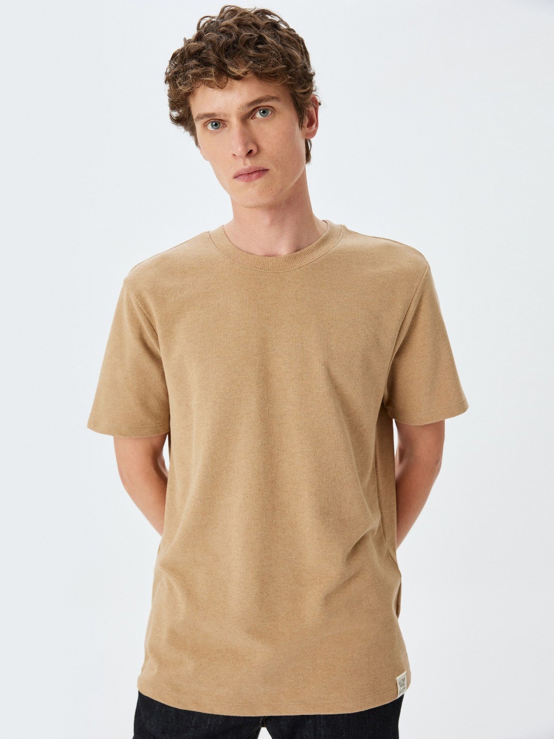 

Koton Men Solid Round Neck T-shirt, Beige