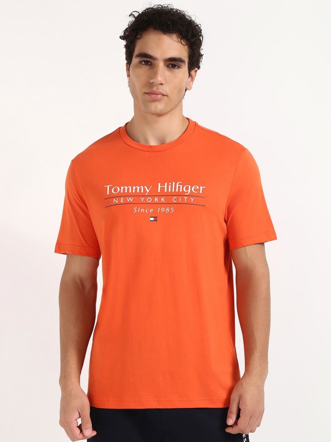 

Tommy Hilfiger Men Typography Printed Round Neck Cotton T-shirt, Orange