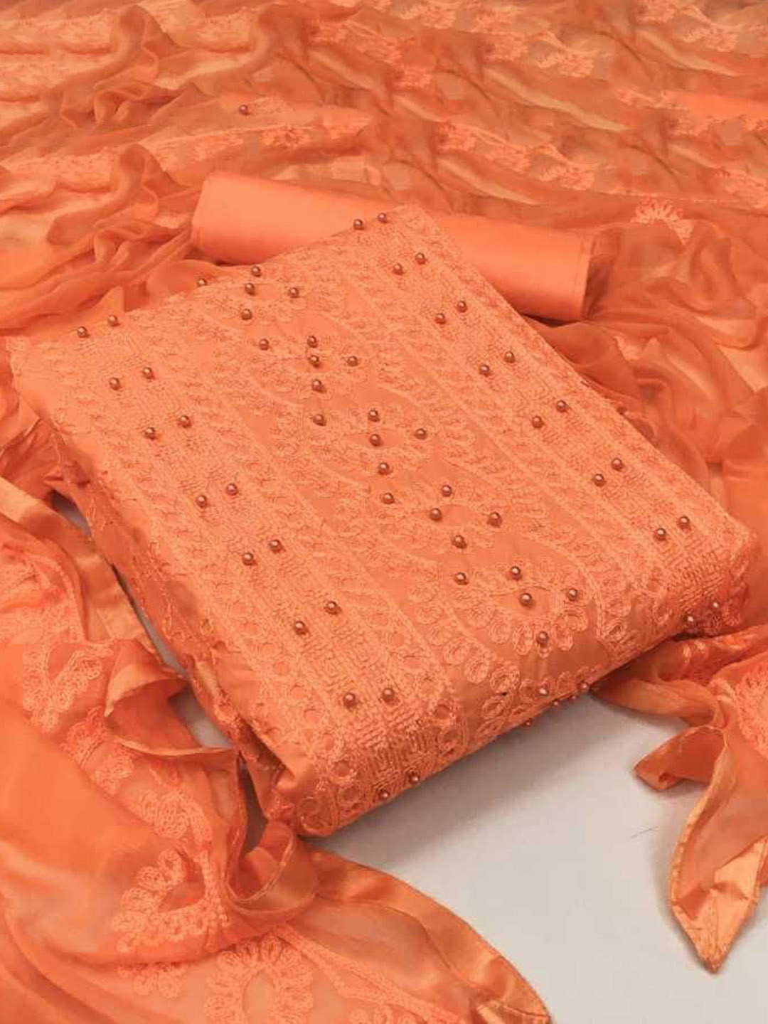 

Suha Unstitched Dress Material, Orange