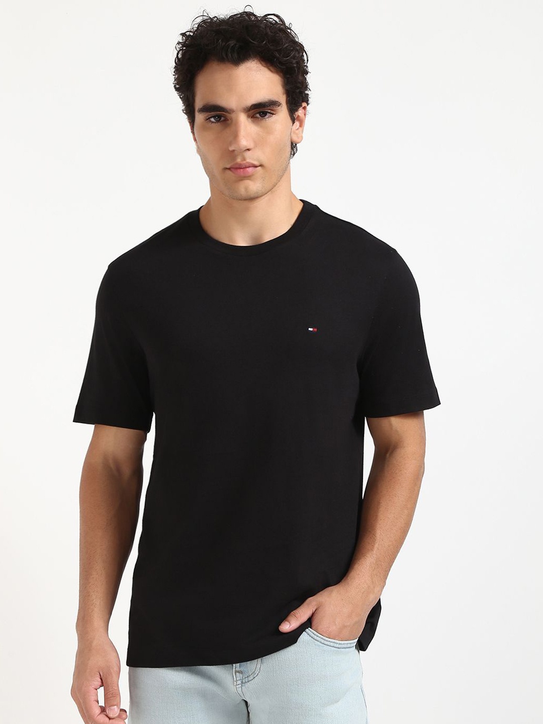 

Tommy Hilfiger Men Solid Round Neck Cotton T-shirt, Black