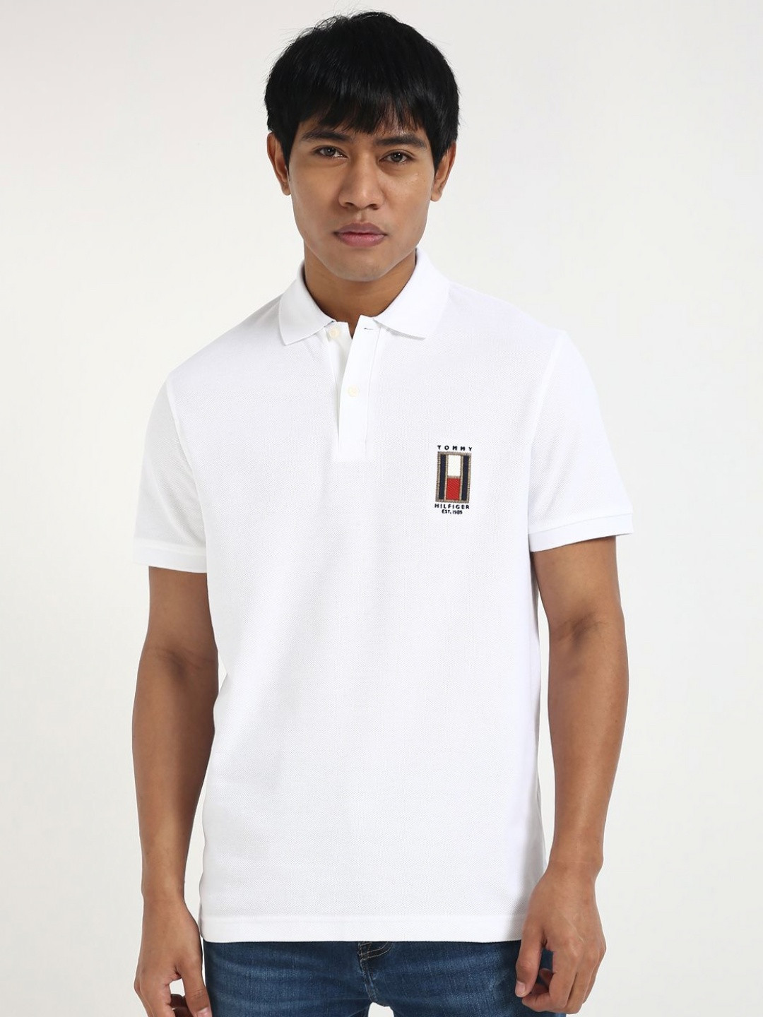 

Tommy Hilfiger Men Solid Polo Collar Cotton T-shirt, White