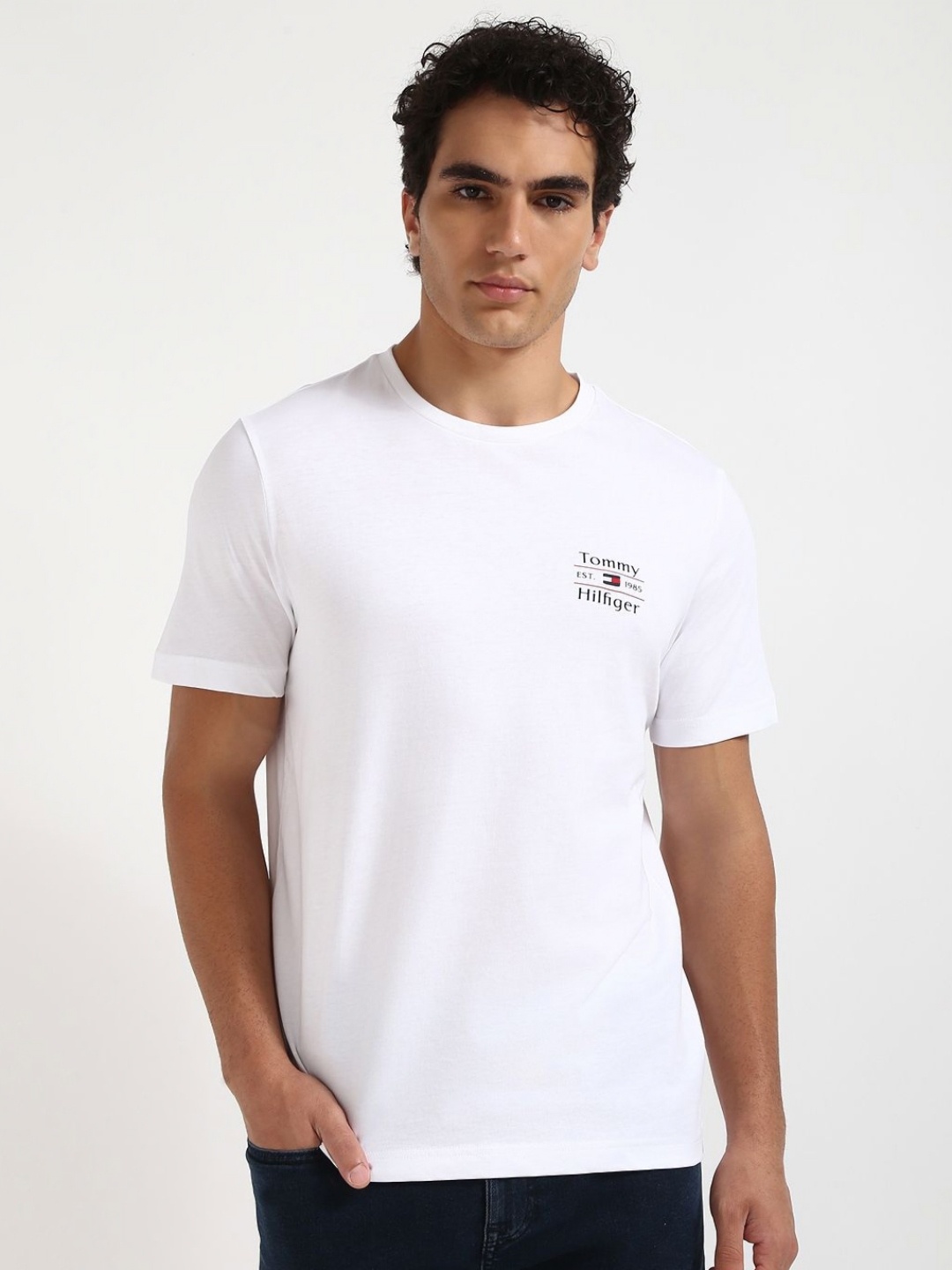 

Tommy Hilfiger Men Solid Round Neck Cotton T-shirt, White