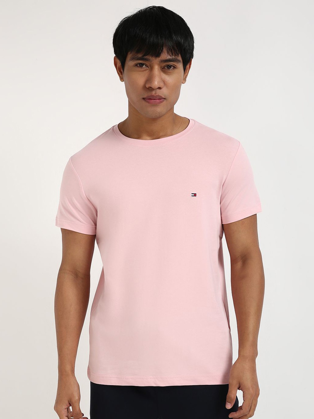 

Tommy Hilfiger Men Solid Round Neck Cotton Slim Fit T-shirt, Pink
