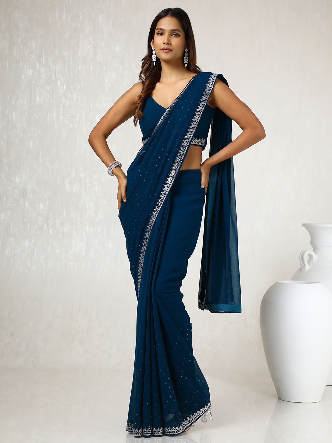 

Soch Women Embellished Beads and Stones Pure Georgette Saree, Navy blue