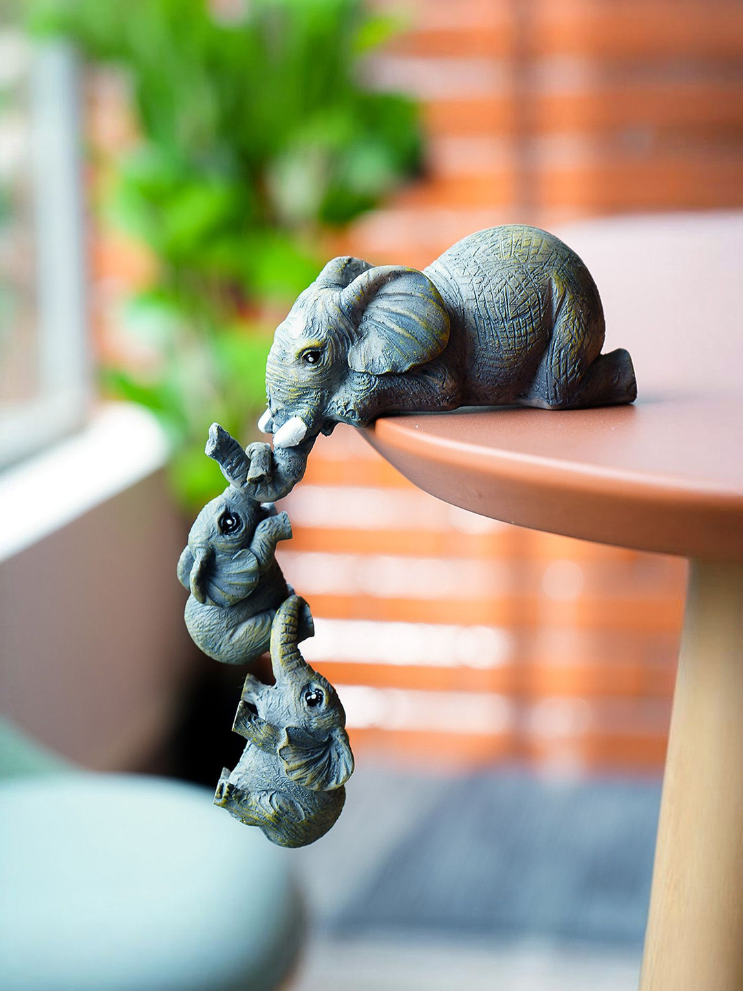 

Ekhasa Grey Elephant with Babies Idol Showpiece