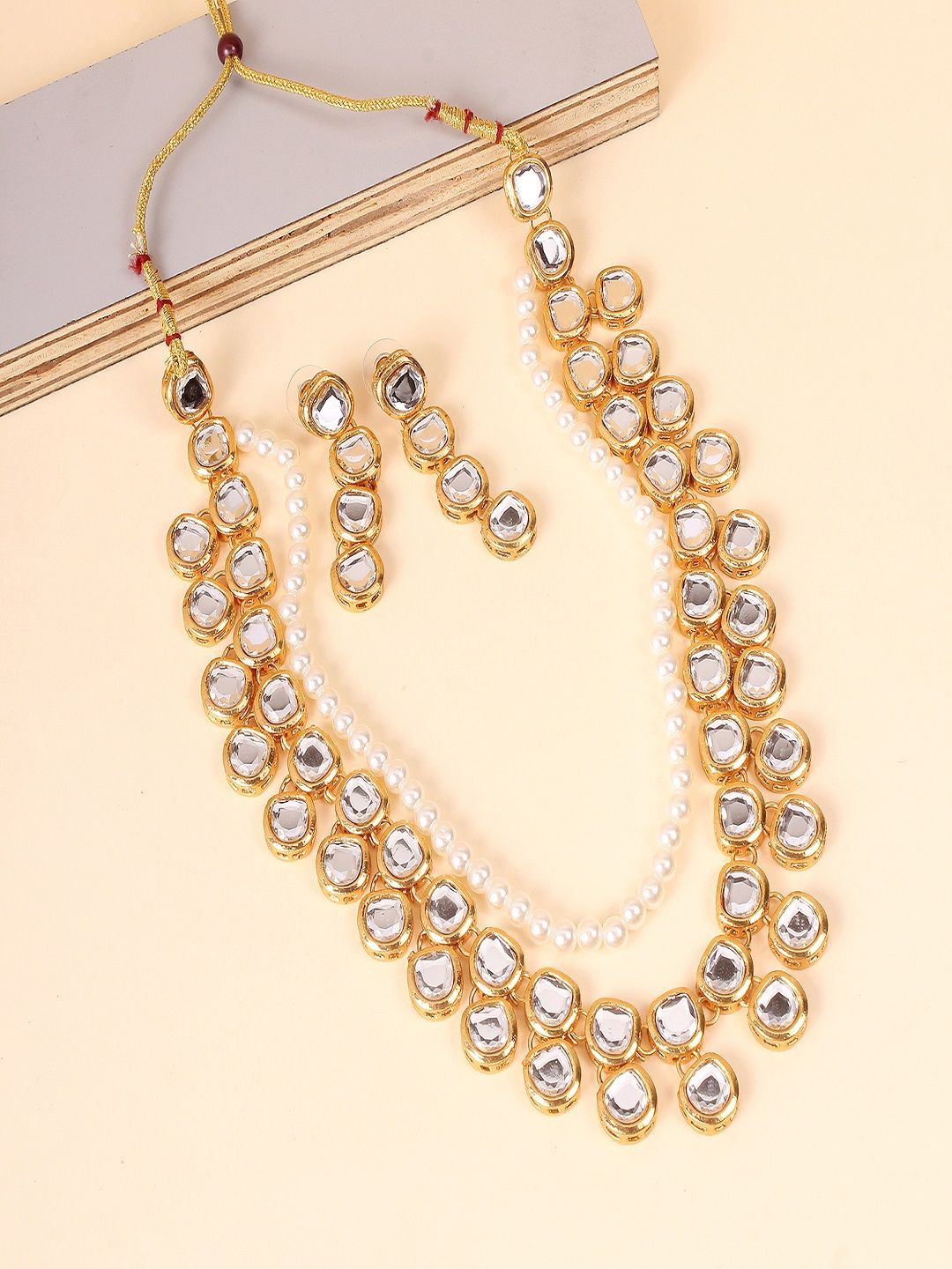 

Divisha Gold-Plated Artificial Stone Studded & Beaded Jewellery Set