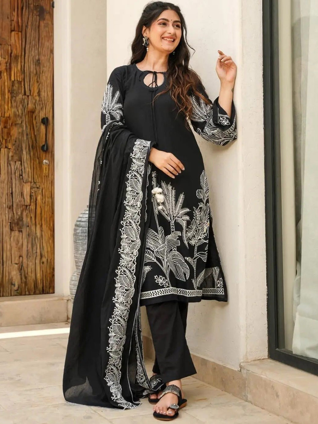 

Vama Heritage Women Floral Embroidered Regular Kurta with Trousers & With Dupatta, Black