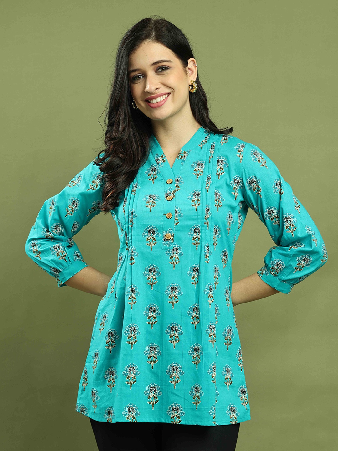 

Rajnandini Women Printed V-Neck Cotton Tunic, Turquoise blue