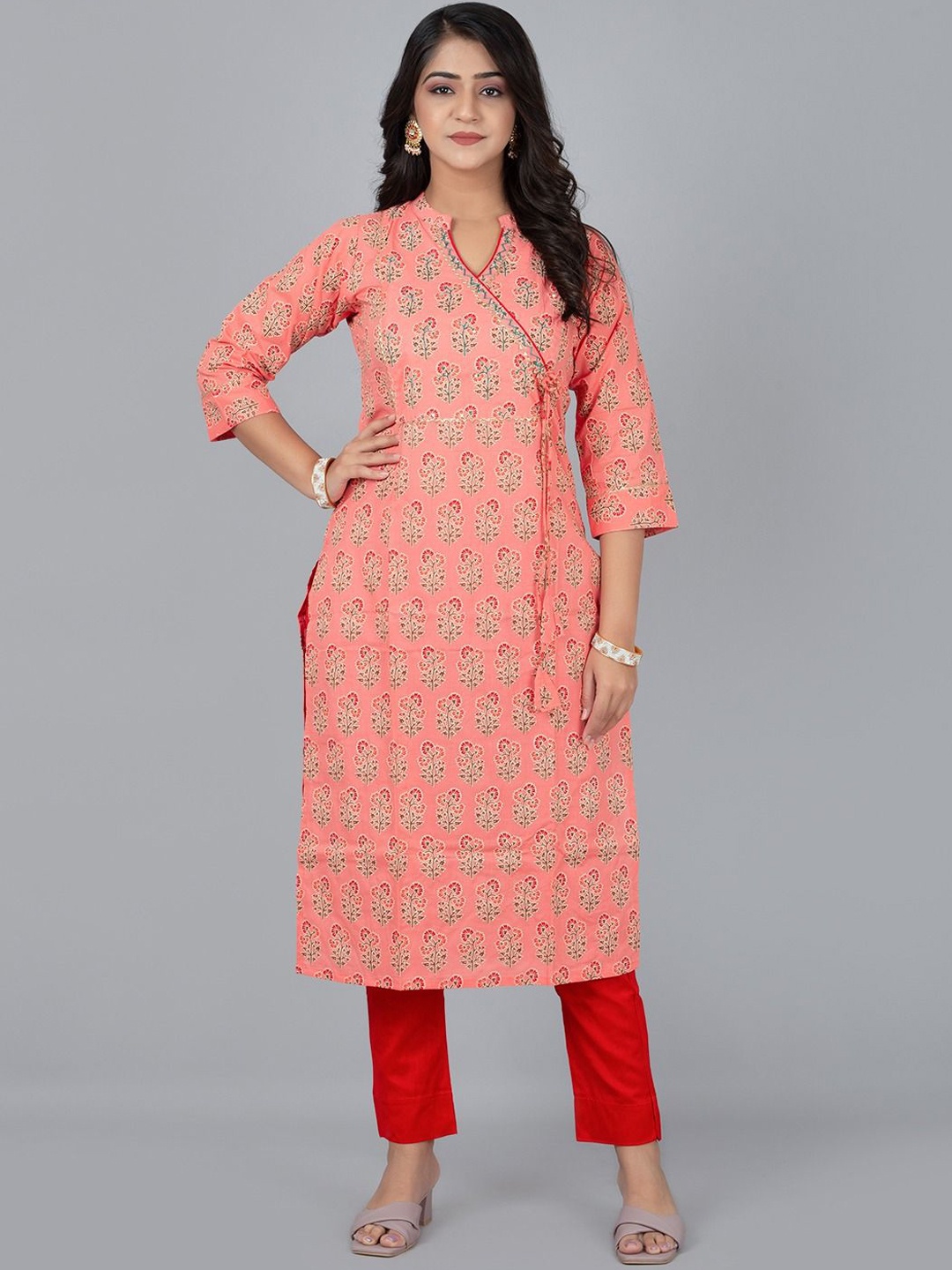

Fashion Petals Women Floral Printed Regular Kurta with Trousers, Peach