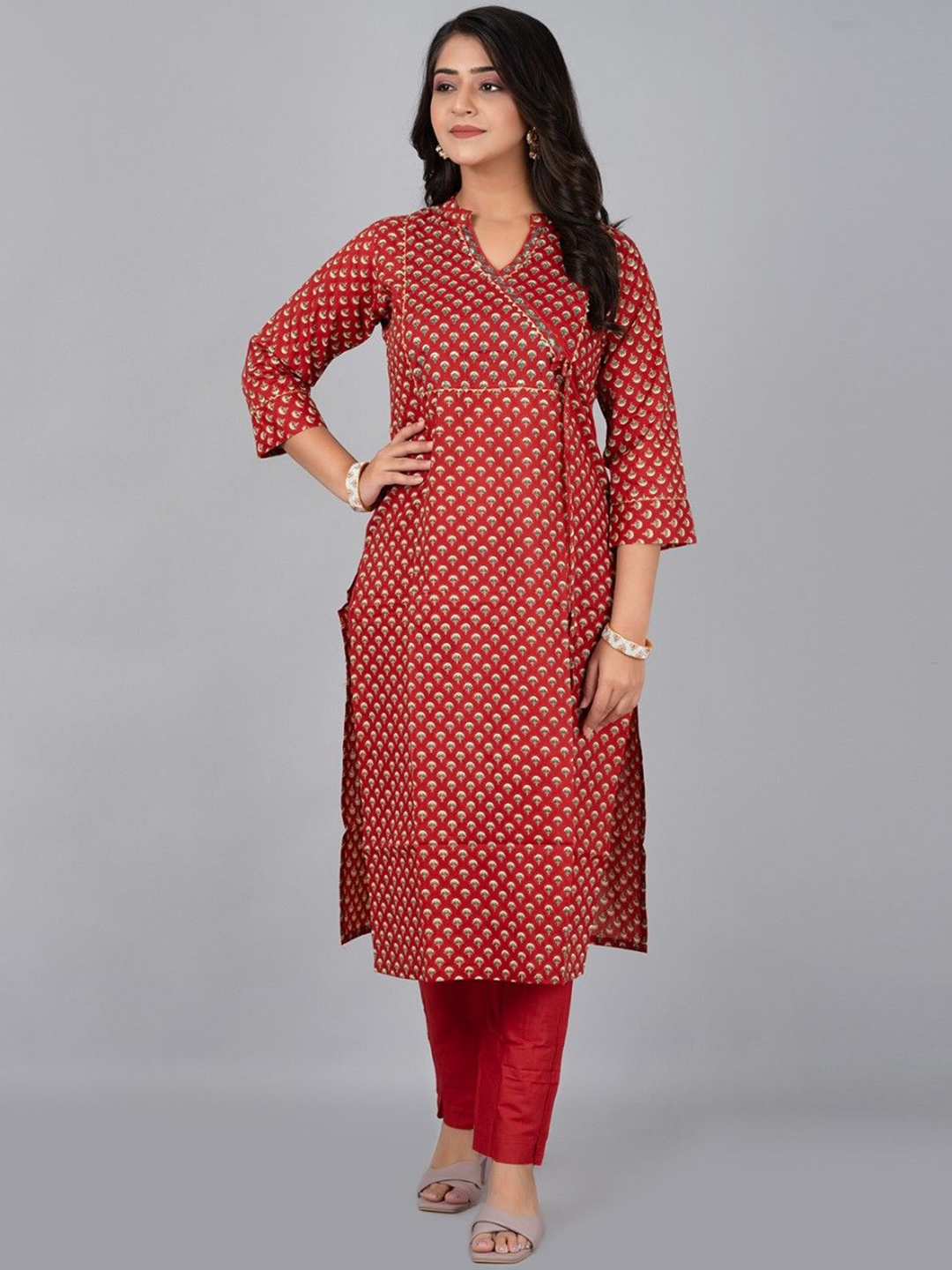 

Fashion Petals Women Ethnic Motifs Printed Regular Kurta with Trousers, Maroon