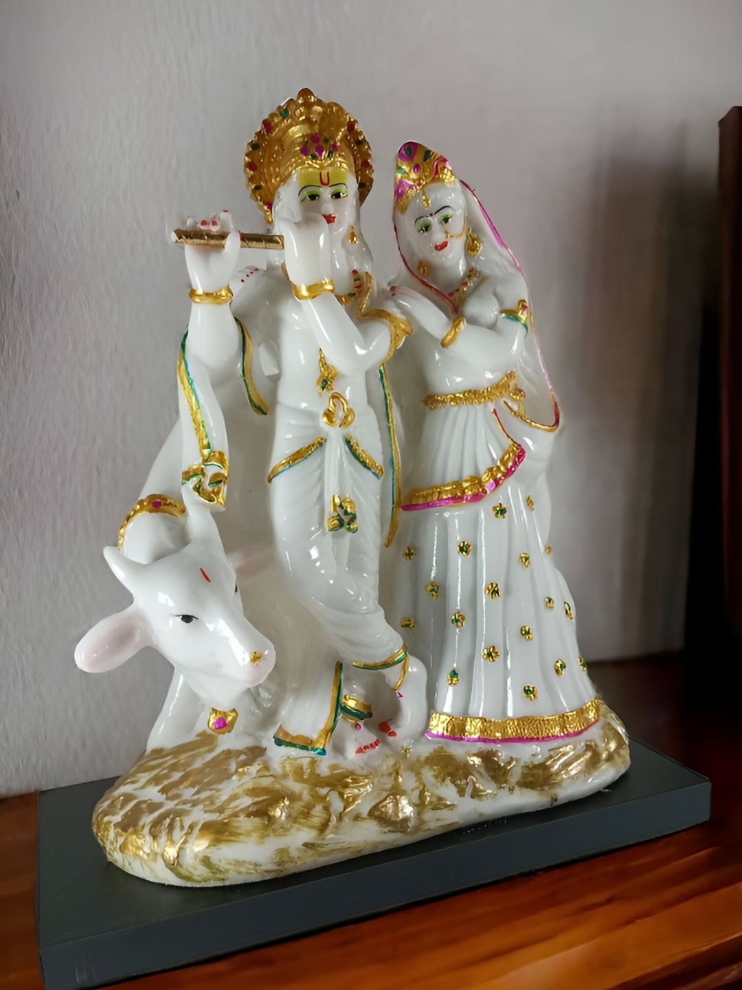 

Vrinban International White Figurine Showpiece