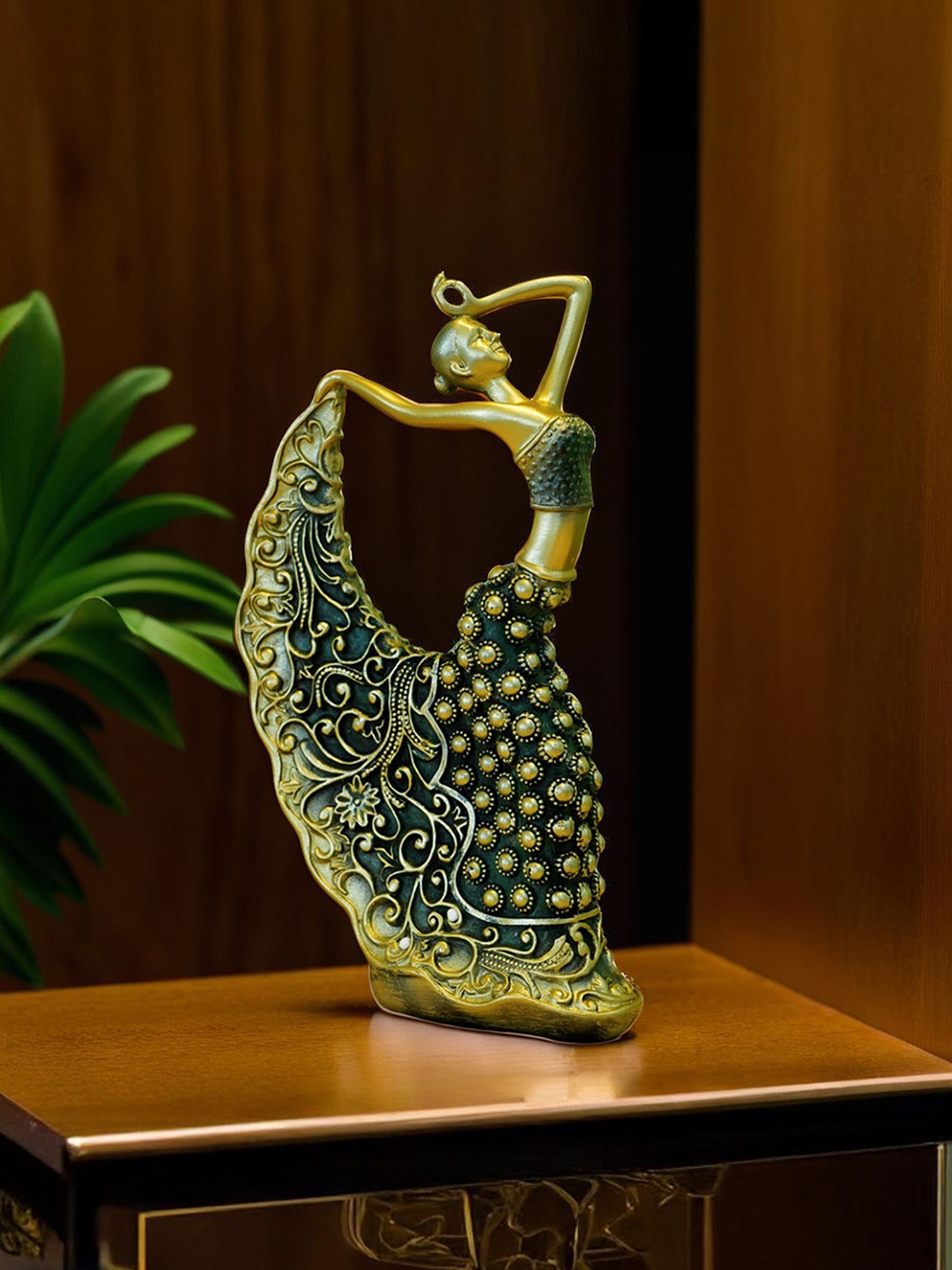 

Ekhasa Gold-Toned Dancing Lady Figurine Showpiece