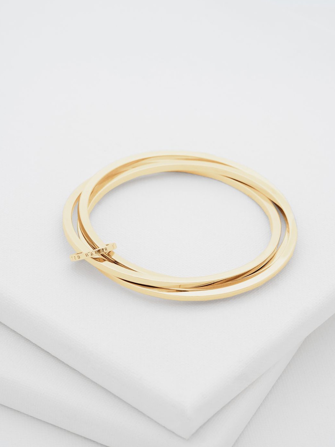 

Ted Baker Women Brass Bangle-Style Bracelet, Gold