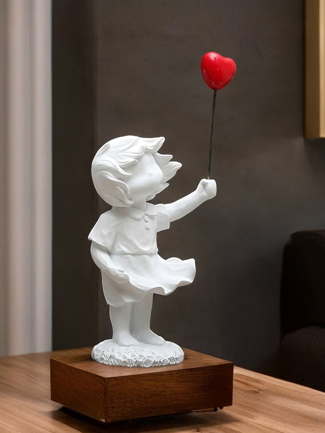 

Ekhasa White Baby Girl with Balloon Figurine Showpiece