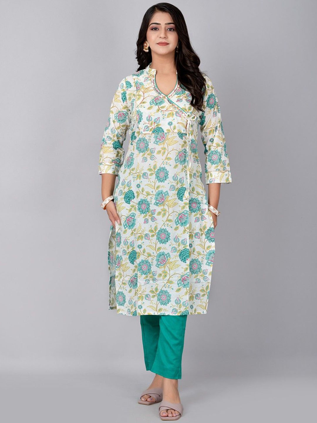 

Fashion Petals Women Floral Printed Regular Kurta with Trousers, Cream