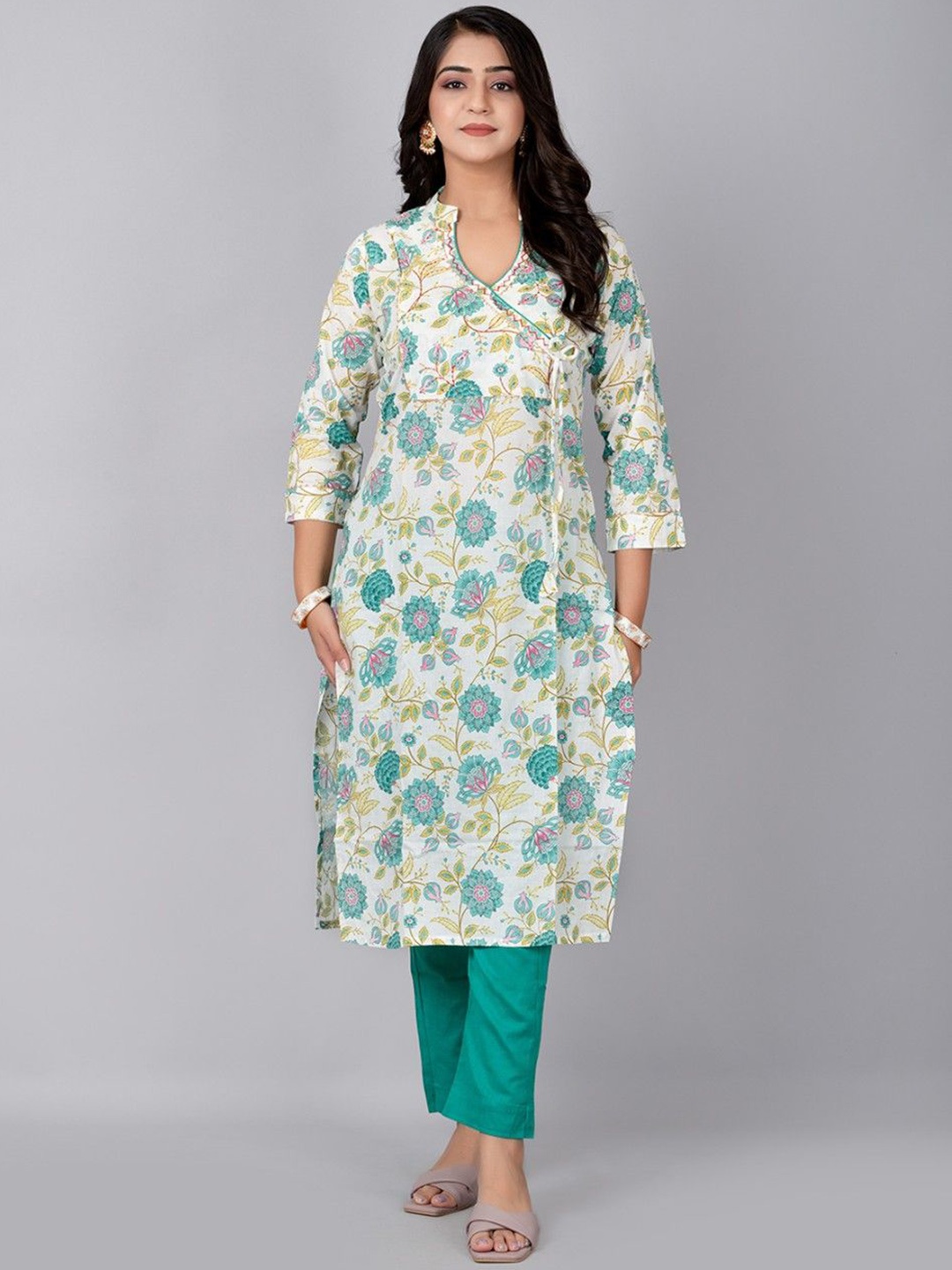 

Fashion Petals Women Floral Printed Regular Kurta with Trousers, Cream