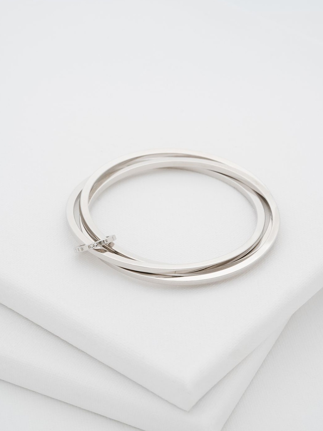 

Ted Baker Women Brass Bangle-Style Bracelet, Silver