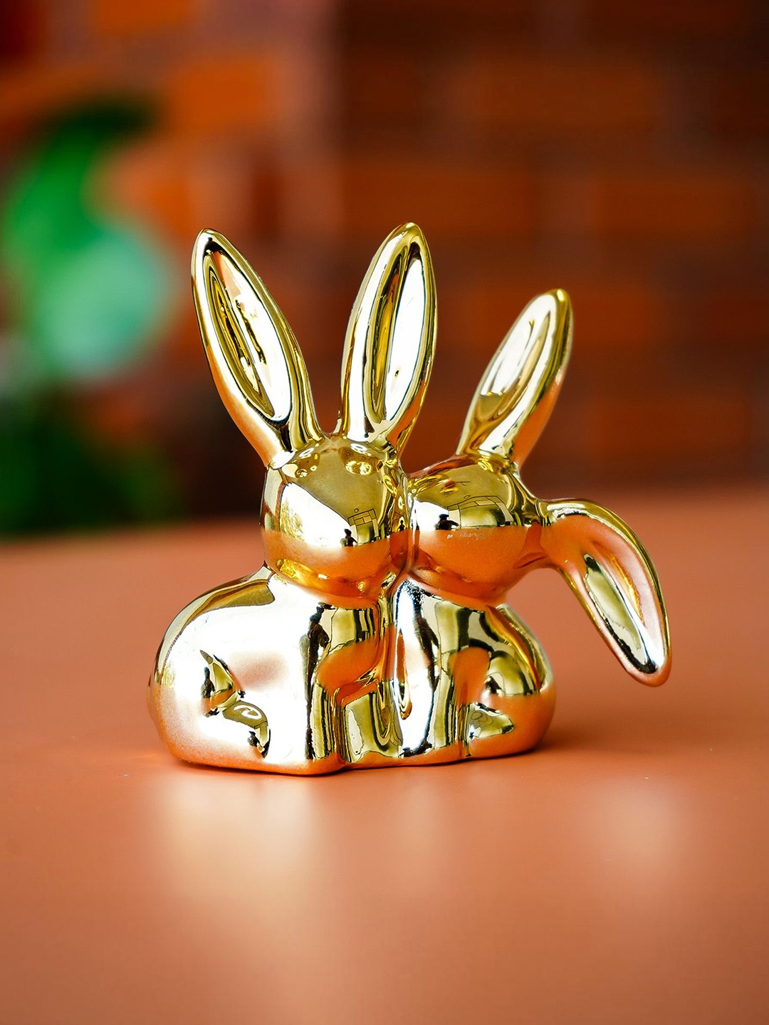

Ekhasa Gold-Toned Rabbit Figurine Showpiece