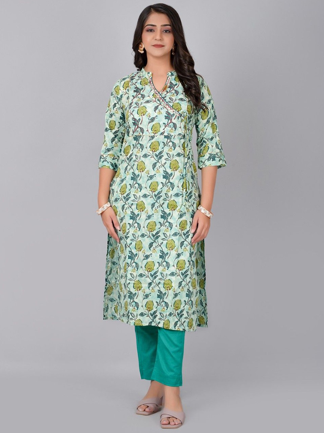 

Fashion Petals Women Floral Printed Regular Kurta with Trousers, Green