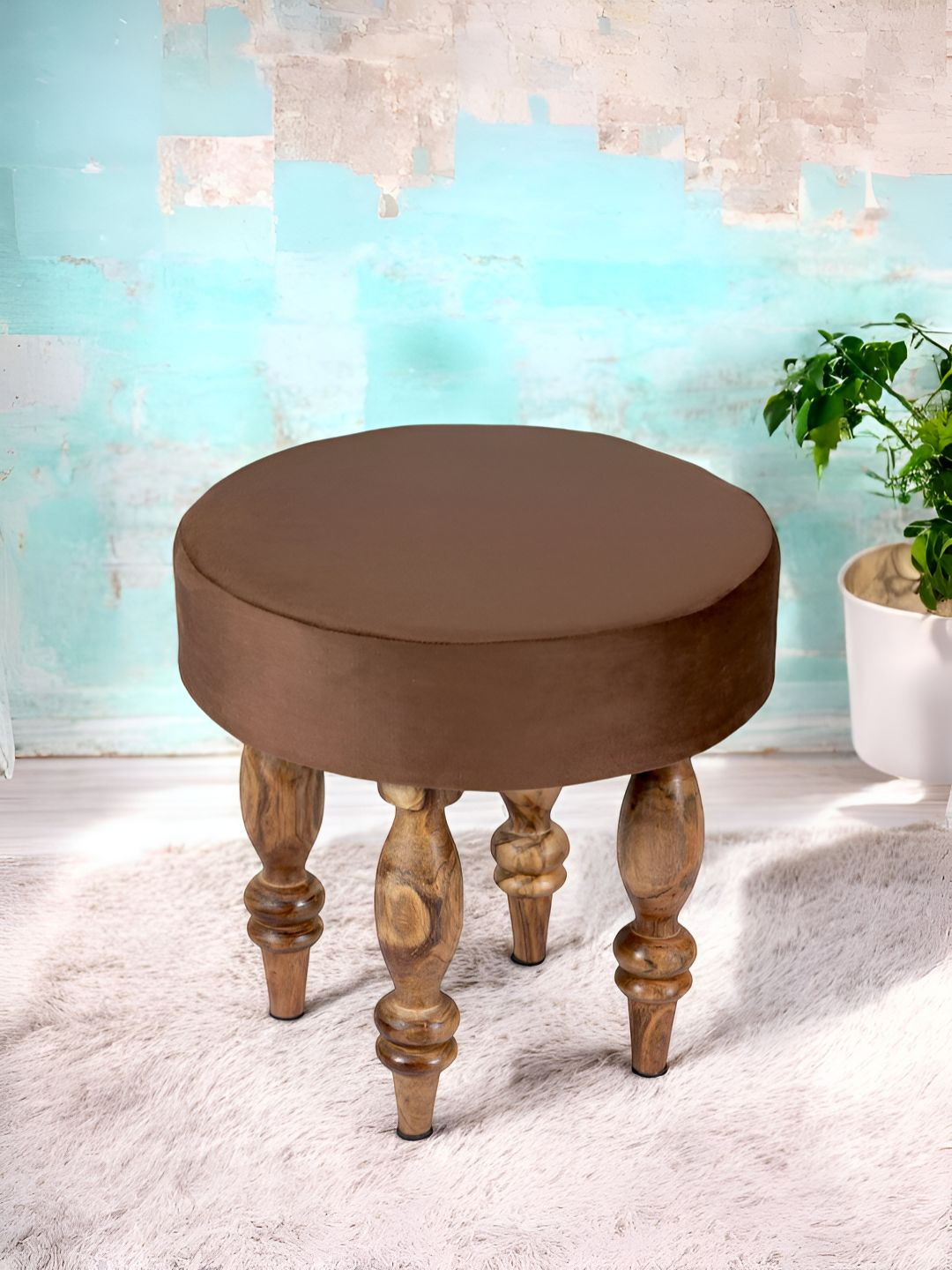

Ikiriya Brown Round Wooden Stool in Velvet Upholstery