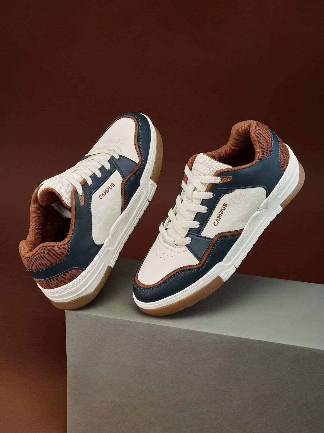 

Campus Men Colourblocked PU Sneakers, Off white