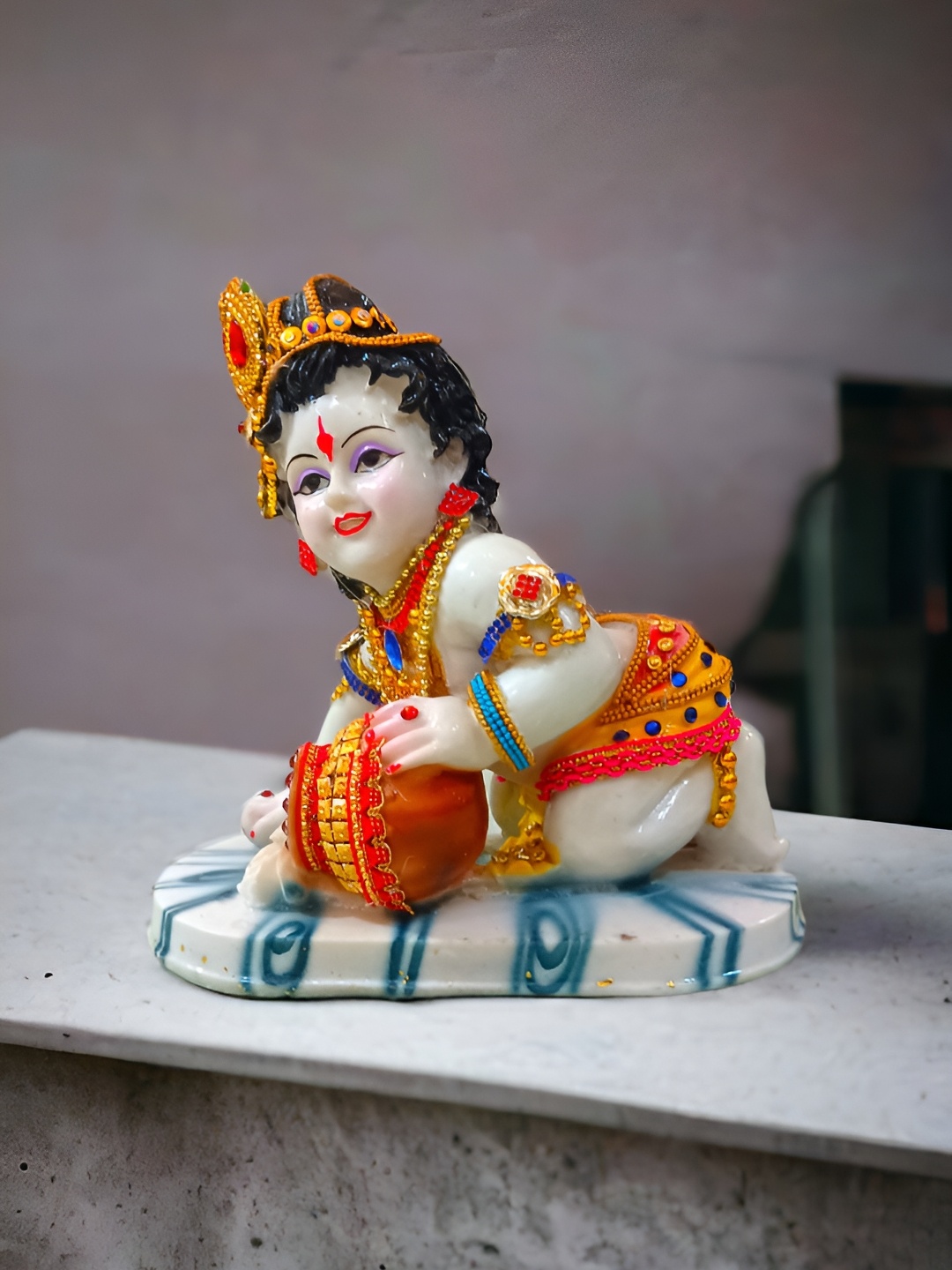 

Vrinban International Orange Religious Figurine Showpiece