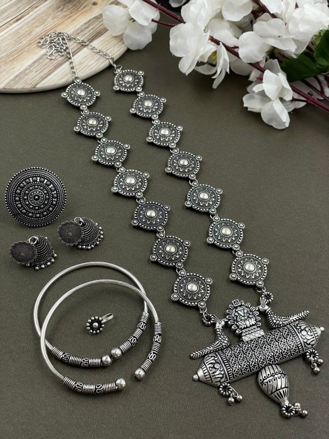 

NAMAN ARTS Ramya Silver-Plated Oxidised Necklace Jewellery Set