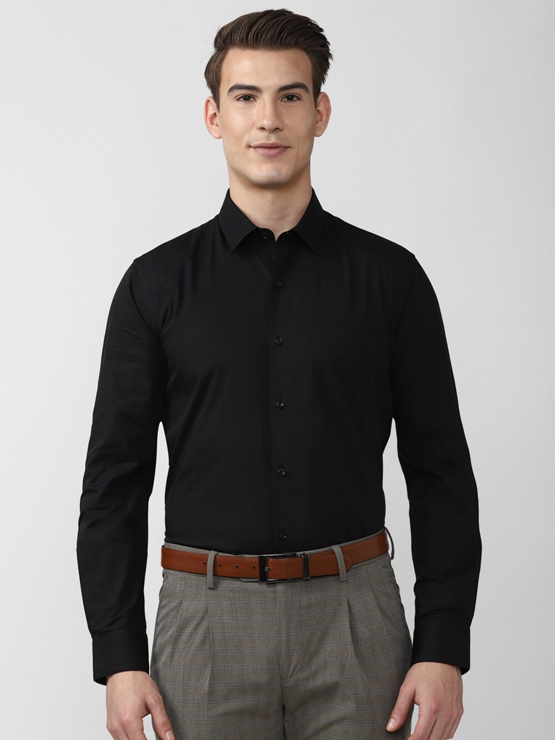 

Peter England Men Black Solid Formal Shirt