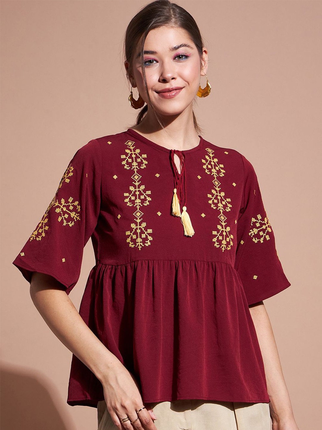 

DressBerry Women Self Design Empire Regular Top, Maroon