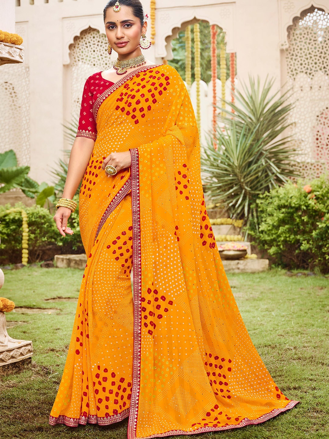 

Laxmipati Bandhani Sequinned Poly Chiffon Designer Saree, Mustard