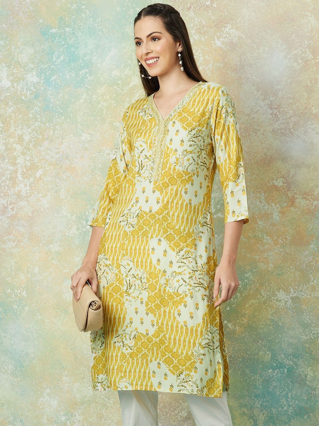 

Melange by Lifestyle Women Printed Flared Sleeves Sequinned Kurta, Mustard