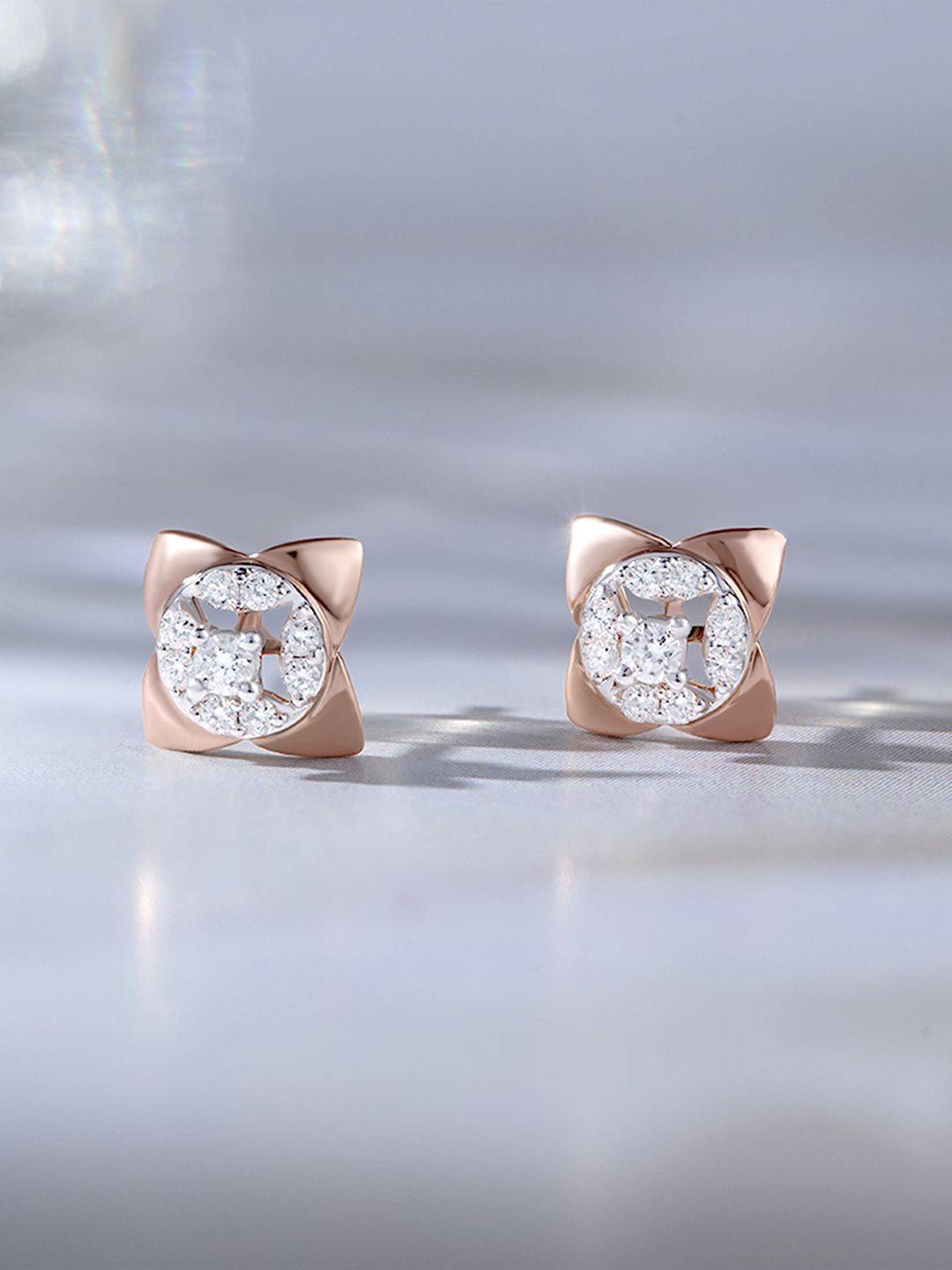 

Mia by Tanishq 14KT Blossom Spark Gold & Diamond Stud Earrings - 1.54 gm, Rose