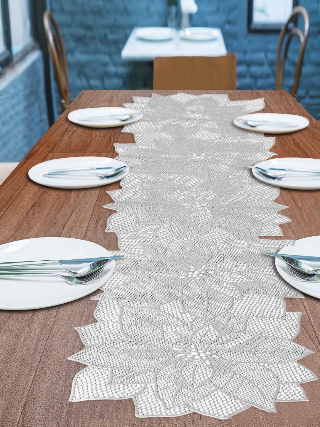 

Dakshya Industries Silver Toned Floral Water-Proof Table Runner