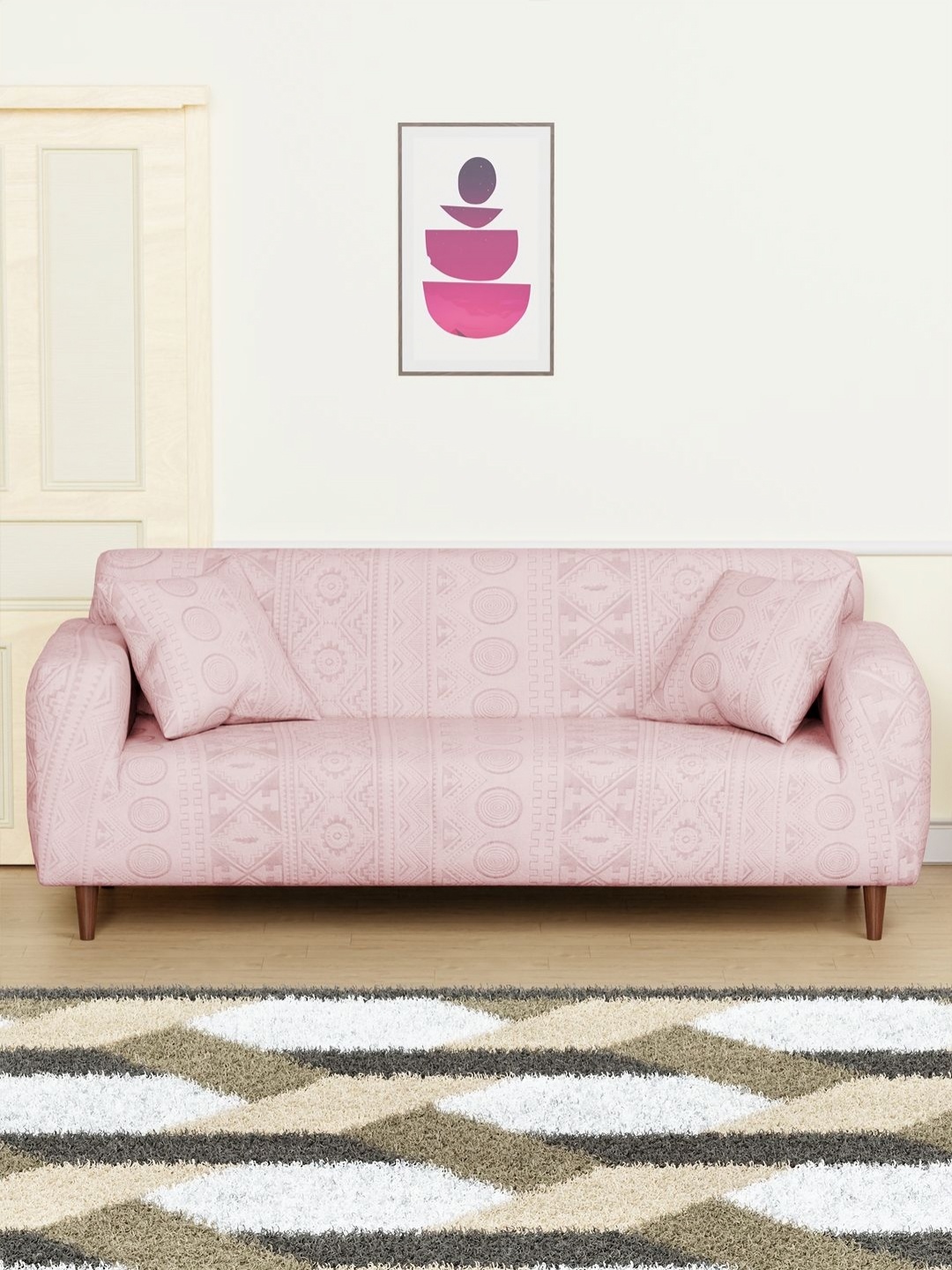 

Myntra Elegant Homes Pink Tribal Pattern Three Seater Sofa Cover With Cushion Covers