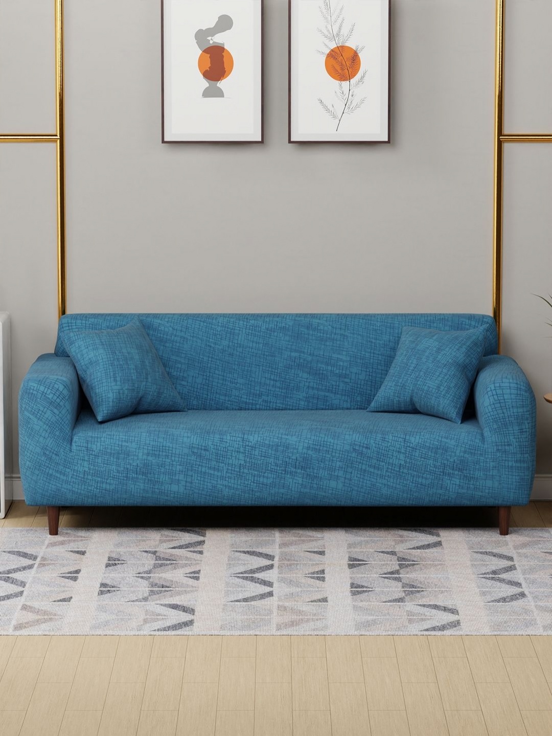 

Myntra Elegant Homes Blue Abstract Printed Three Seater Sofa Cover With 2 Cushion Covers