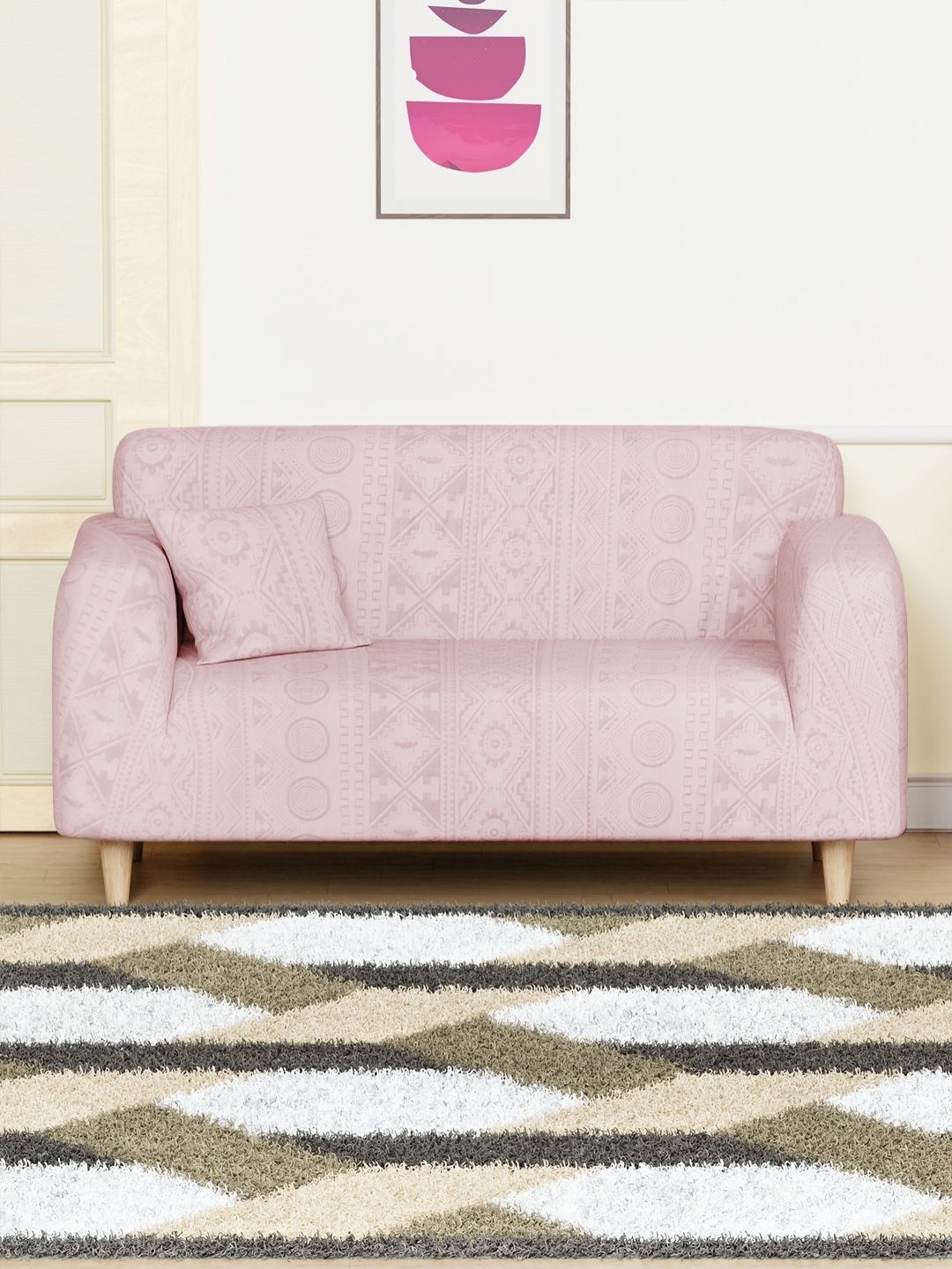 

Myntra Elegant Homes Pink Tribal Pattern Two Seater Sofa Cover With Cushion Cover